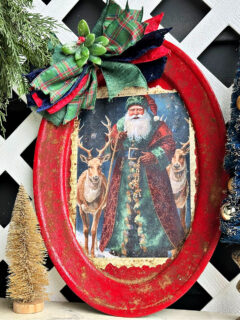 old world santa wall art from a silver tray