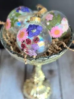 Pressed Flower Christmas Ornaments in bowl