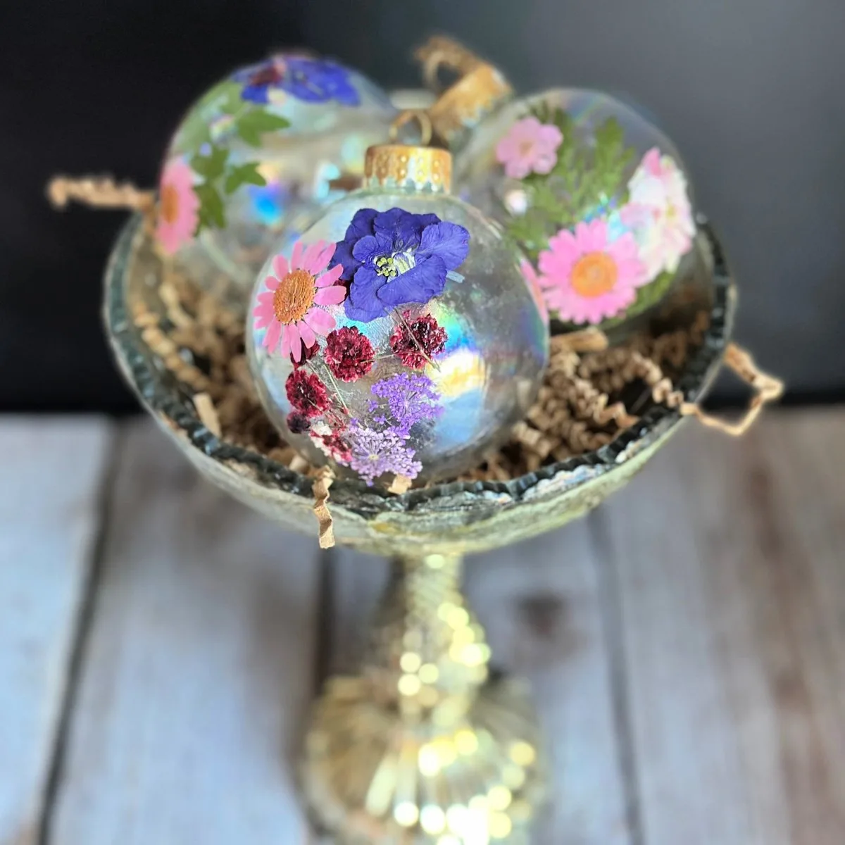 Pressed Flower Ornaments close up in silver bowl