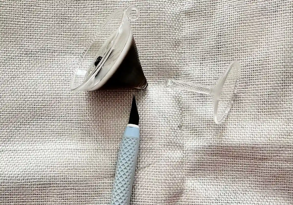 cutting martini glass with knife