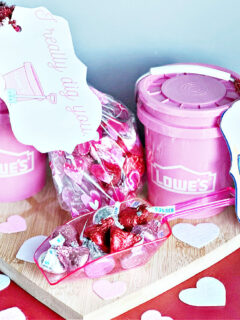 pink lowes mini buckets with dirt pudding dessert