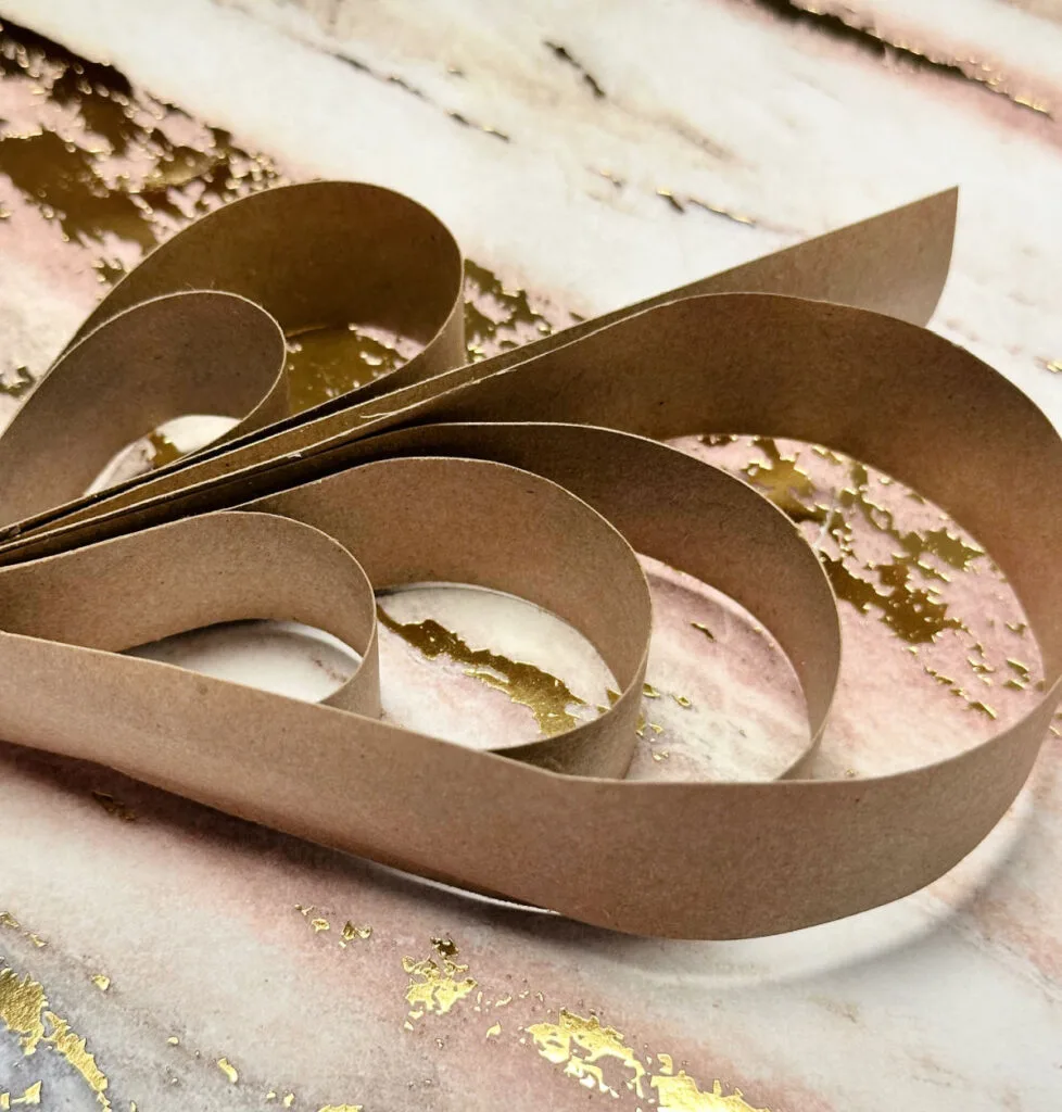 top view of paper strips shaped in heart