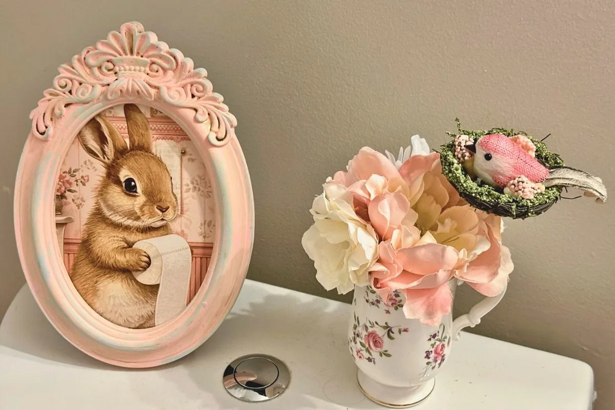 bunny holding toilet paper roll bathroom art