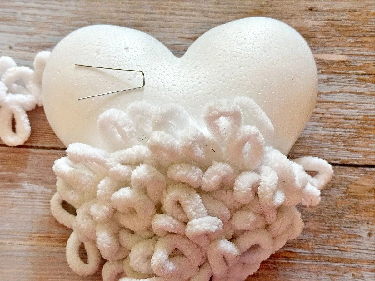 putting loop yarn in foam heart