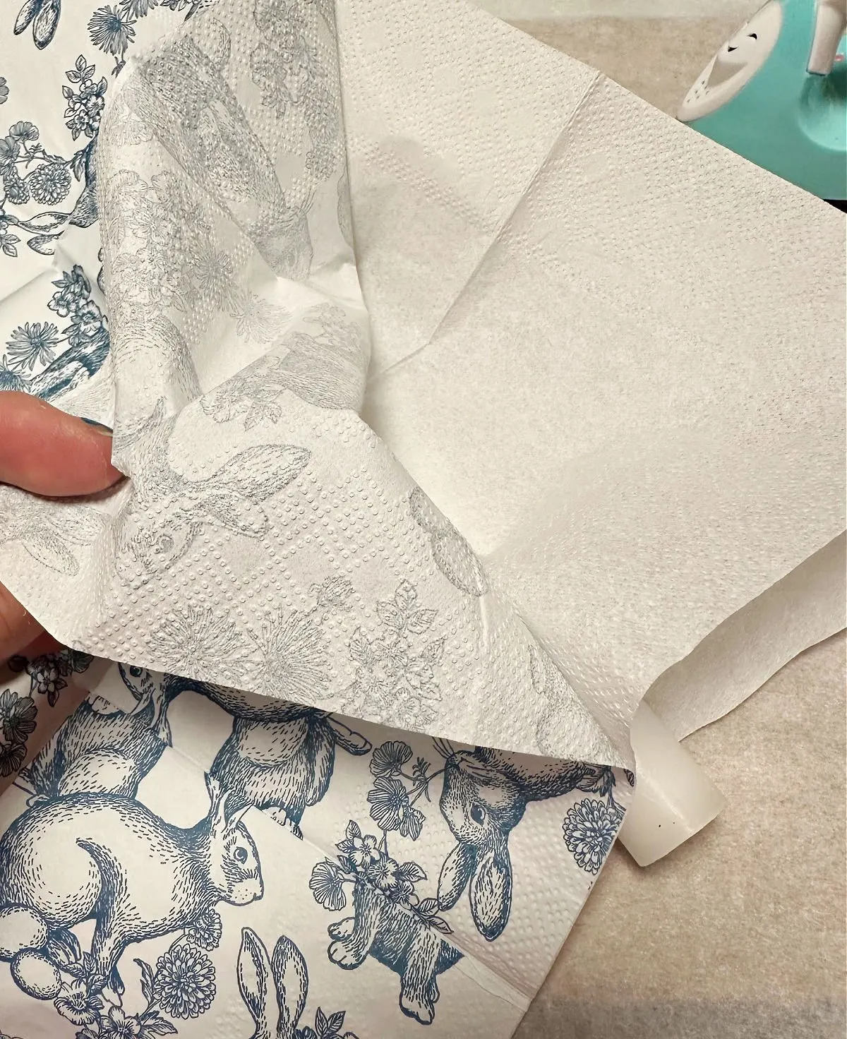 removing top layer of napkin