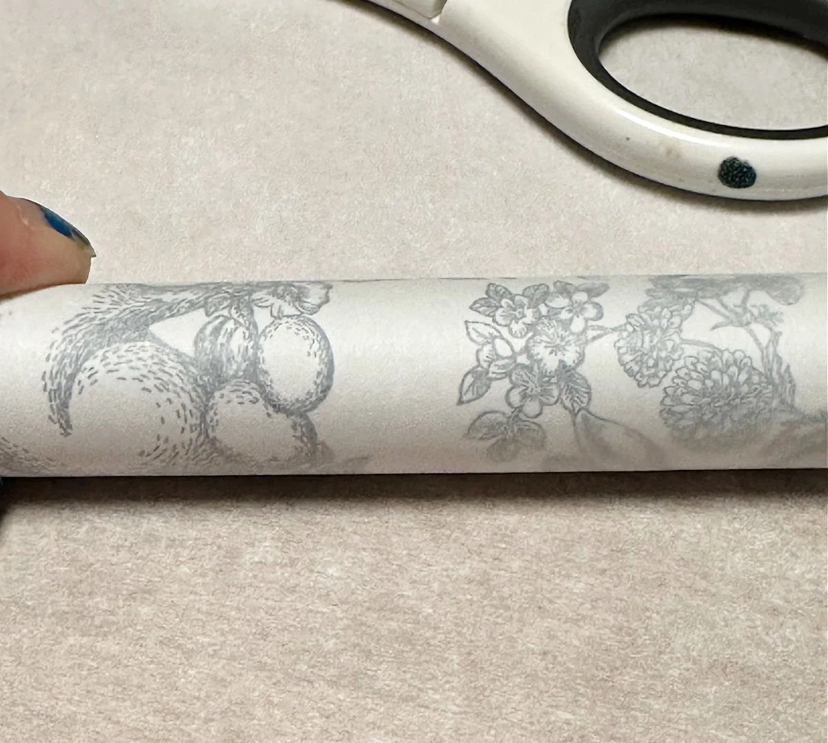 napkin placed on candle with parchment paper