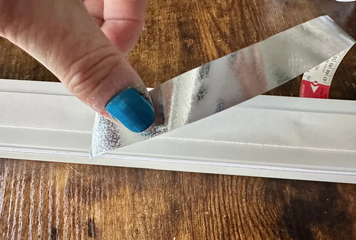 removing adhesive from redi shade