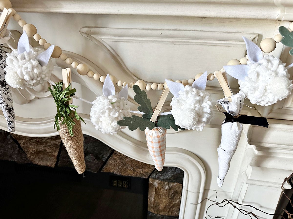 close up of bunny garland on mantel