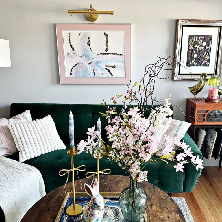 spring living room with thrift store wall art