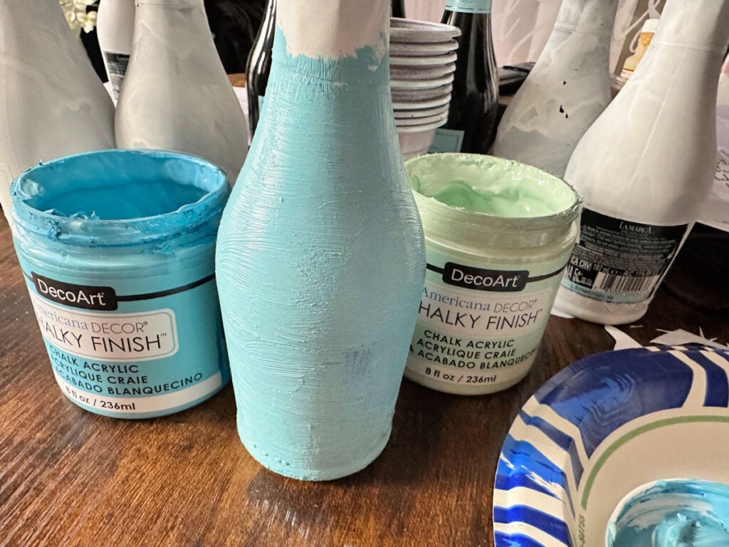 deco art chalky finish paint on champagne bottles