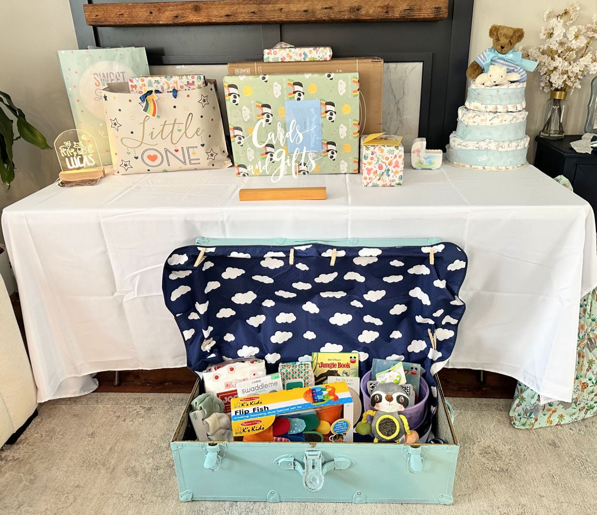 antique steamer trunk shown with baby toys