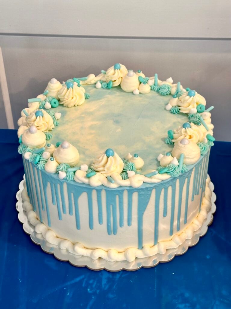 baby shower drip cake with fondant