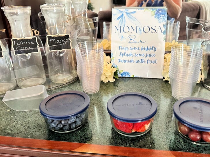 mimosa bar set up with fruit