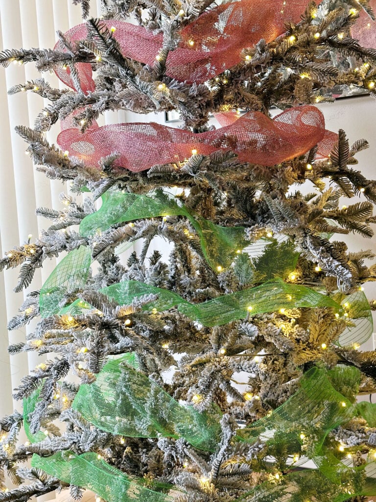 pink and green deco mesh ribbon on tree