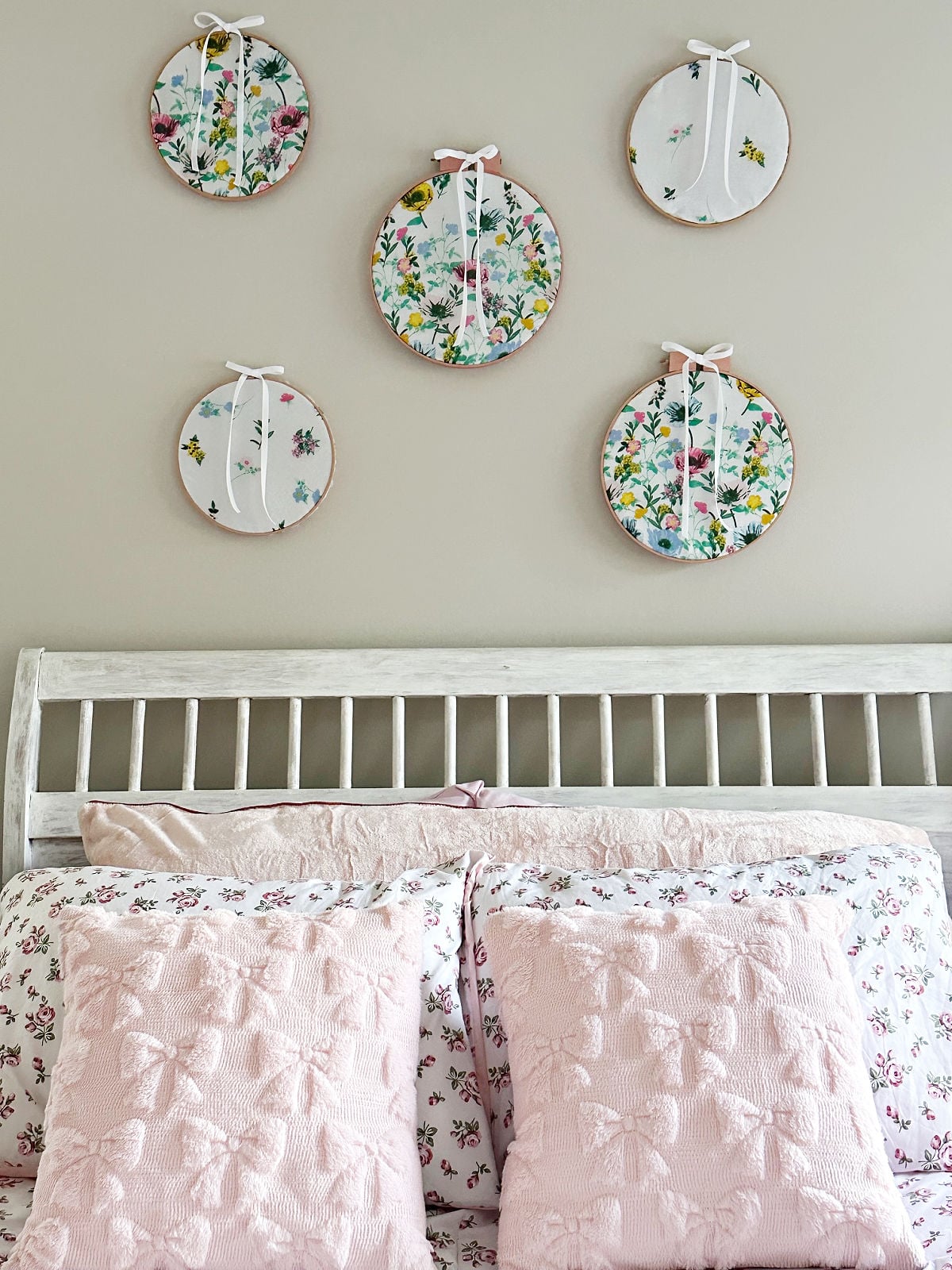 cottage core bedroom with embroidery hoop wall art