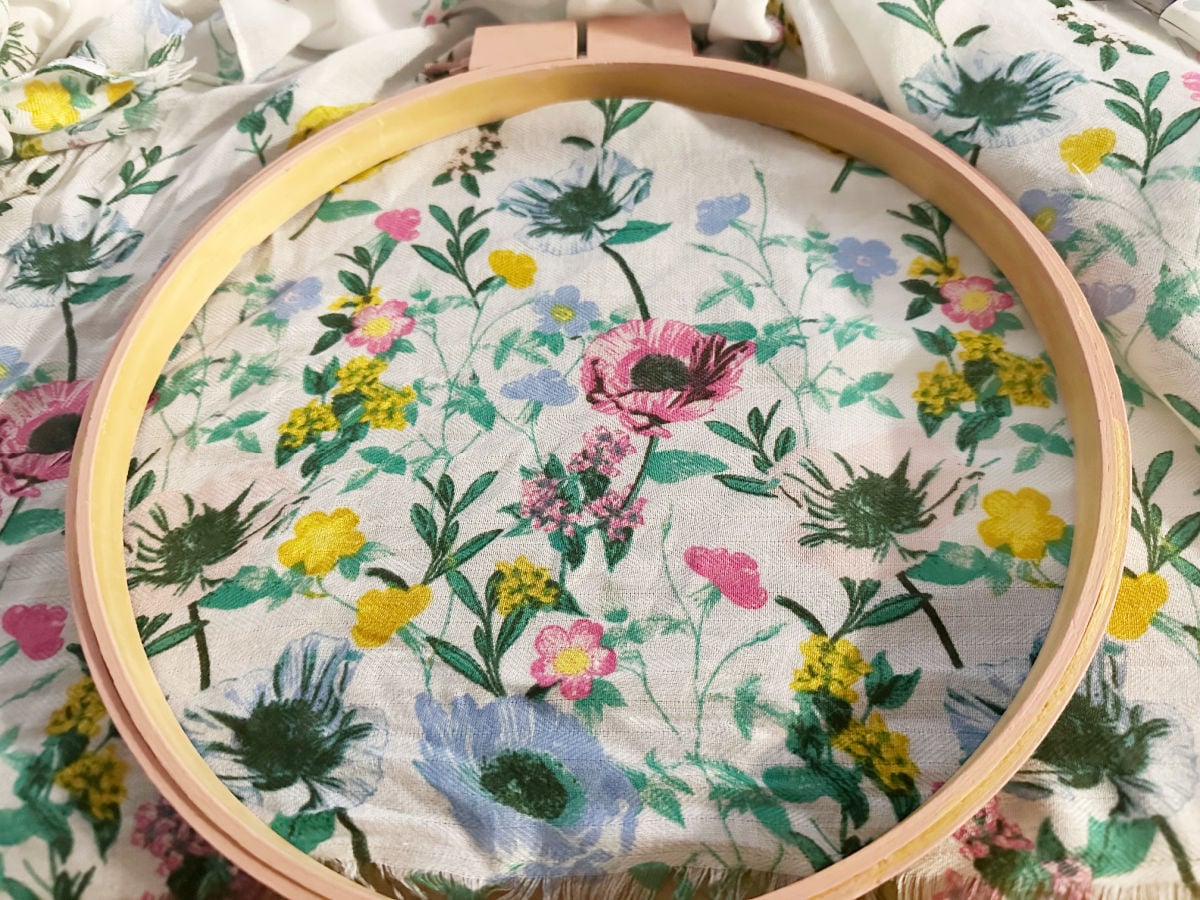 placing fabric in embroidery hoop